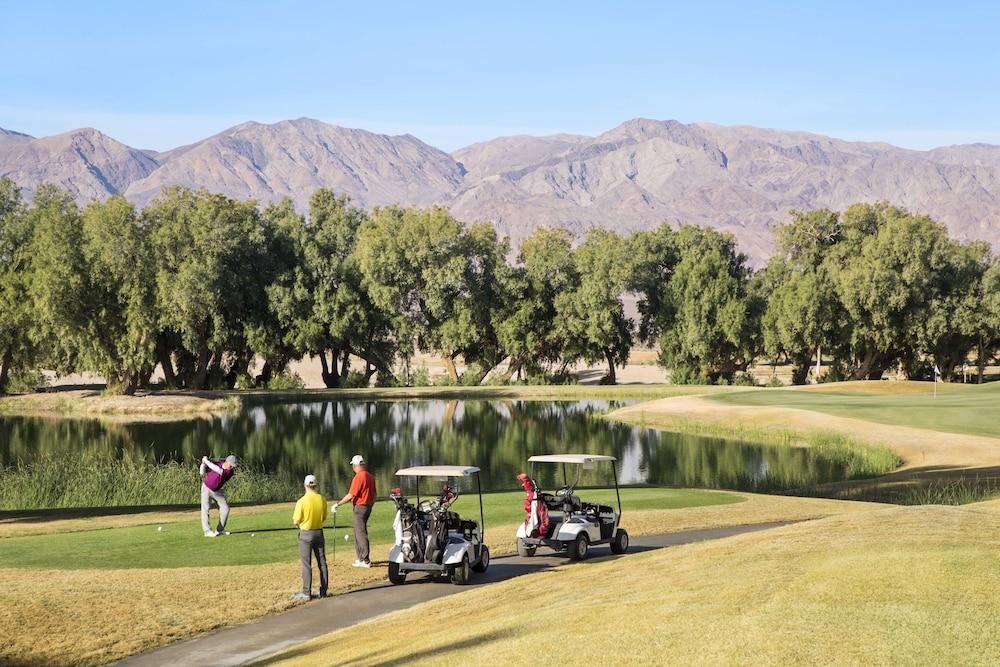 The Inn At Death Valley Exterior photo Golfers at the 17th hole